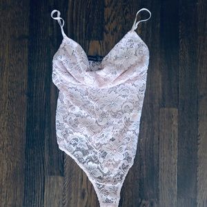 Laced light pink body suite